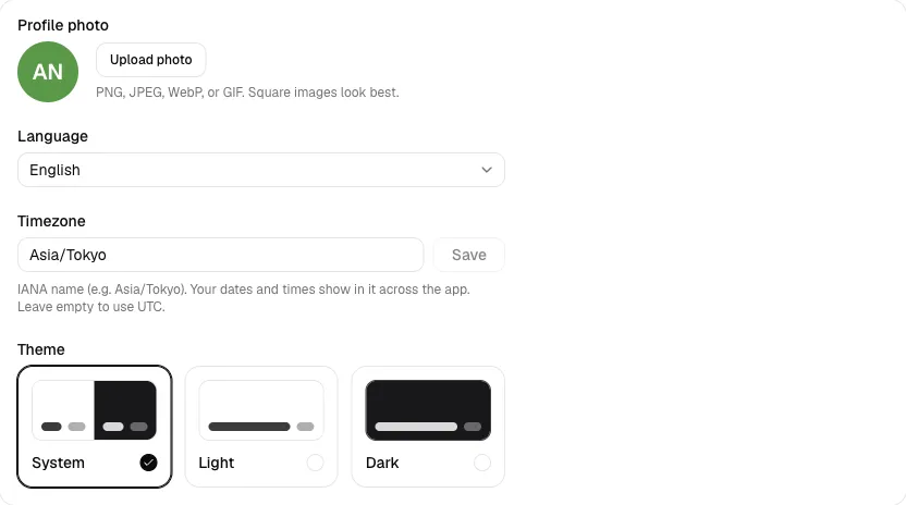 The Preferences page with the profile photo, language, timezone, and theme
controls.